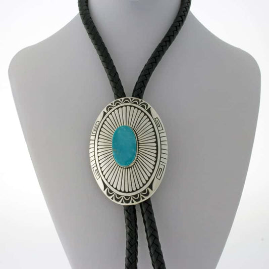 Matching bolo tie and belt buckle