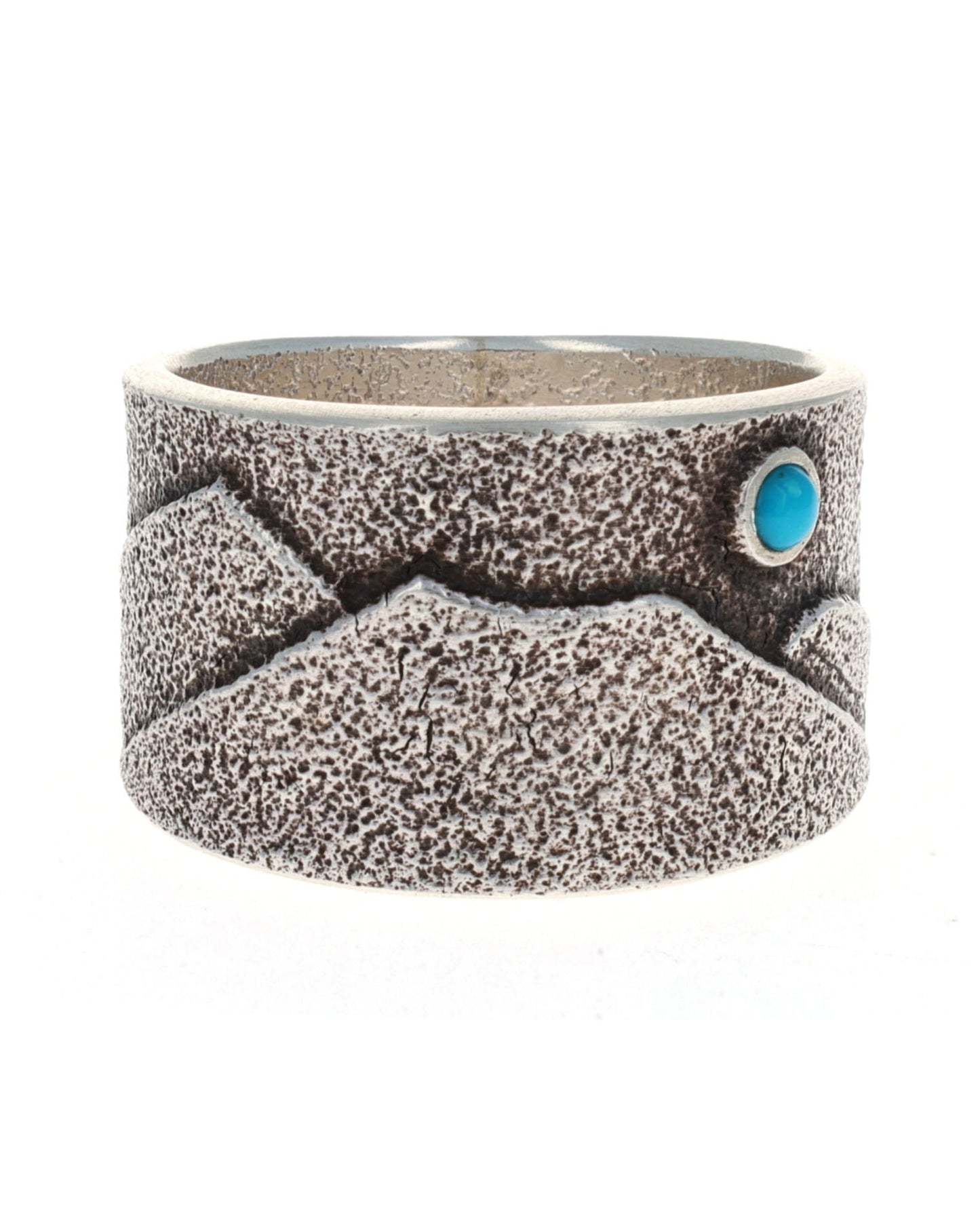 Anello con scena montana in tufa fuso