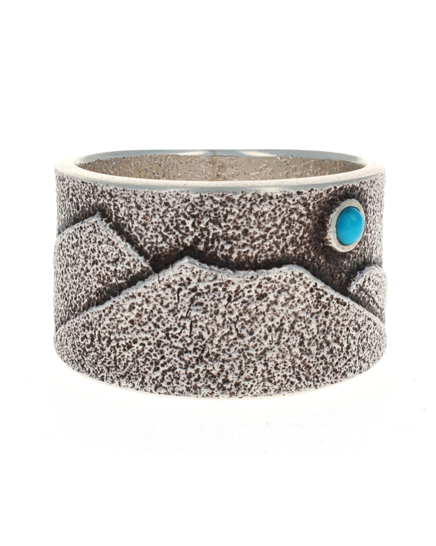 Anello con scena montana in tufa fuso