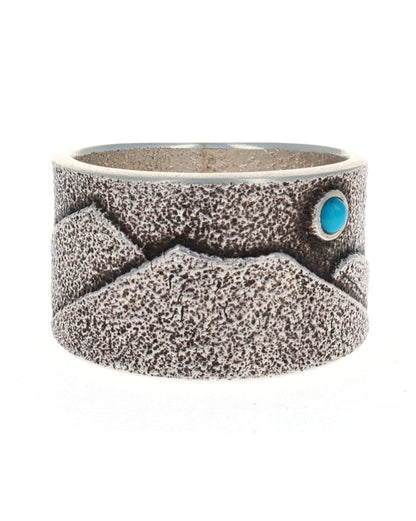 Anello con scena montana in tufa fuso