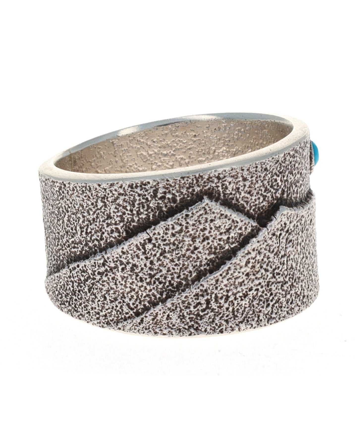 Anello con scena montana in tufa fuso