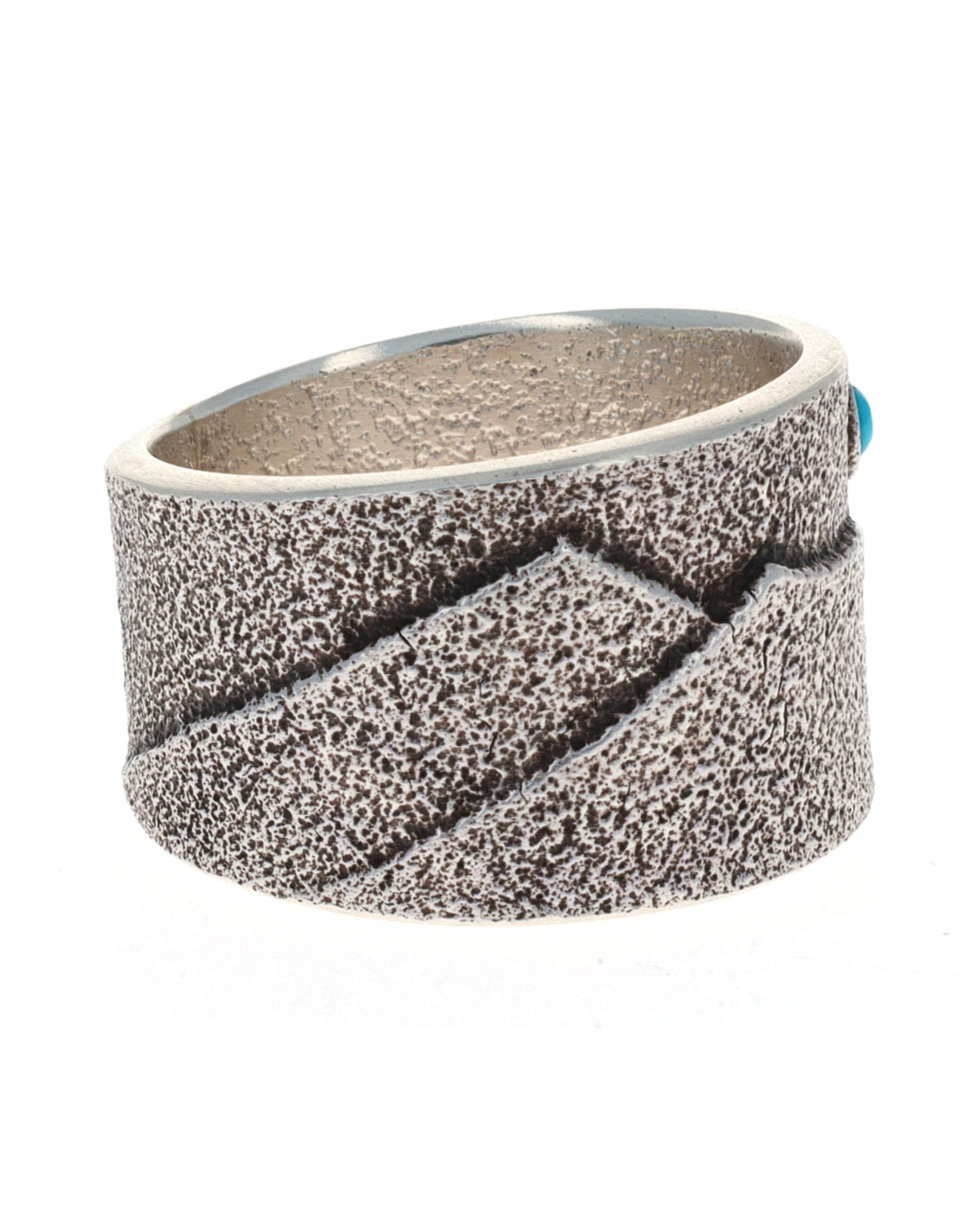 Anello con scena montana in tufa fuso