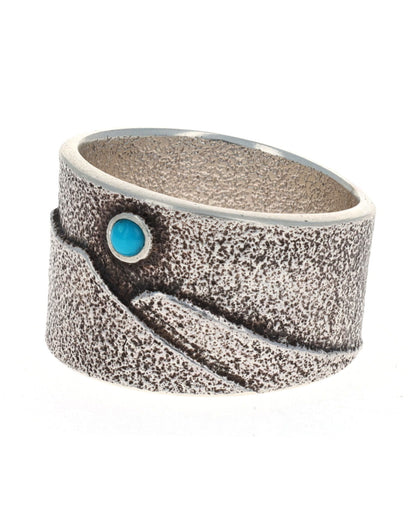 Anello con scena montana in tufa fuso